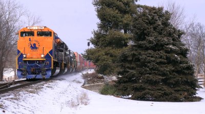 CNJ 1071 brightens up a overcast Winter afternoon as it brings train 376 by East Talmage 