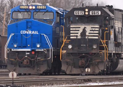 Conrail and the droopy horse.  NS 891 & 276 in the East yard at Danville 