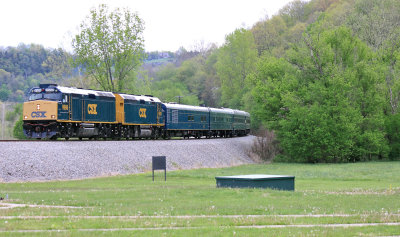 The CSX train passes the Frankfort Sportsmans Club shortly after departing from downtown 