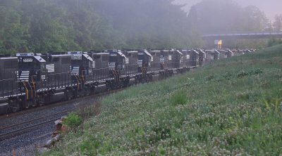 A string of GP38-2s with NS markings painted out, headed back to the leasing company