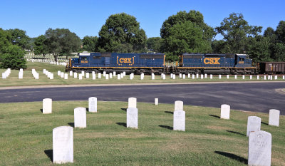 A pair of EMD's bring a Southbound through the National Cemetery in Nashville