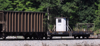 A PAL Shoving Platform trails an empty coal train at Spring Lick