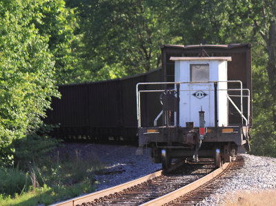 A PAL Shoving Platform trails an empty coal train near the Armstrong mine at McHenry