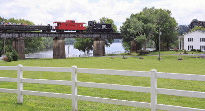 A K&HR Baseball train crosses the Holston River Bridge near Marbledale, TN