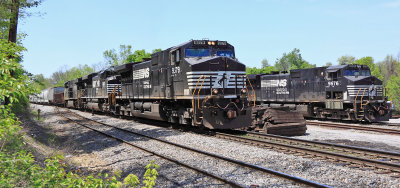 NS 111 passes a Bad Order D9 at West Waddy