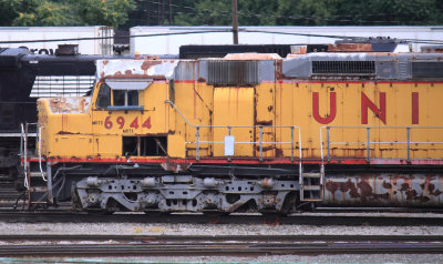UP DD40X #6944 waits for a fresh new paint job outside the shop at Altoona
