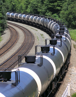 A Eastbound unit oil train climbs the mountain at Cassandra 