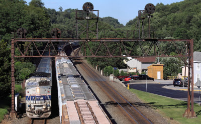 The Westbound Amtrak Pennsylvanian under the PRR signals at Summerhill, PA