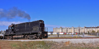 VLIX 2064 passes One of the massive concrete buildings that once made up the core of the Secret City in Oak Ridge