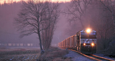 Fire in the Sky, Fog in the Valley  NS 8007 leads a TVA coal train through Spring Lick at sunset 