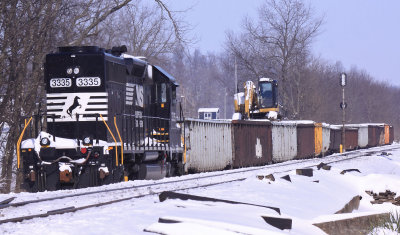 A former Conrail SD40-2 in the house track at Talmage with a work train 