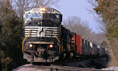 NS 7203, A SD80Mac, leads NS 167 out of the Salt River bottoms near McBrayer, KY 