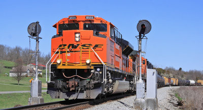 A BNSF Ace leads CSX Q573 by the searchlight signals at Sulpher 