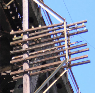 A old codeline pole still survives on the hidden side of the bridge at Burnside