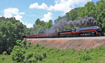 N&W 611 pulls her first public trip in 21 years as she crosses a fill just North of Gretna, NC on the old SOUTHERN mainline.