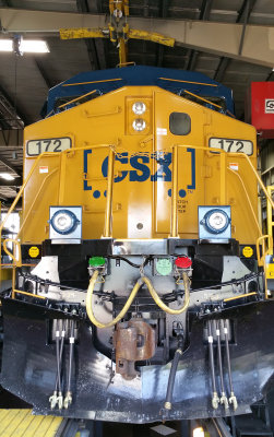 A freshly painted CSX 172 in the PTC mod shop at Corbin 