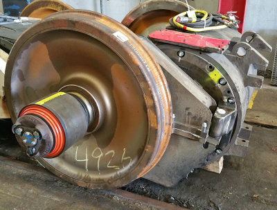 A new traction motor and wheel set ready to go to work  