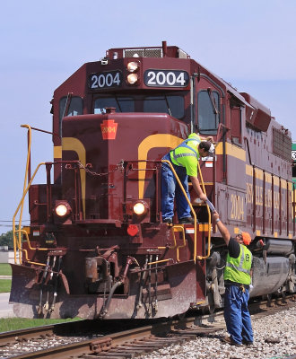 Engineer Jerry and Conductor Tanner look over the switch list before they start thrashing cars at the Columbus yard. 