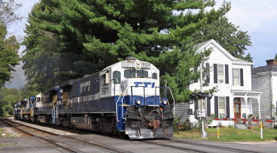 TTI 5911 leads a limestone train East through Maysville on the C&O mainline 