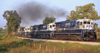 Five hard working GE's lead a Northbound loaded coal train into the morning sun near Millersburg 