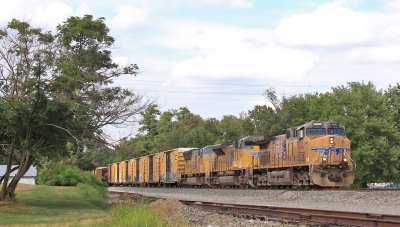 A solid set of UP power brings NS 143 through Burgin 