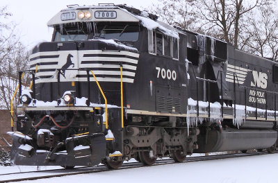 NS SD60E #7000 (former CNW 8026) leads train 112 through the snow at Harrodsburg 