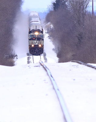 Westbound 273 starts through the big dip at Convoy with its own Winter storm following along 