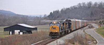 CSX Q254 runs through the mist near Sparta 