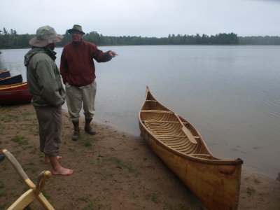 Ferdie Goode and Bill discussing canoes.