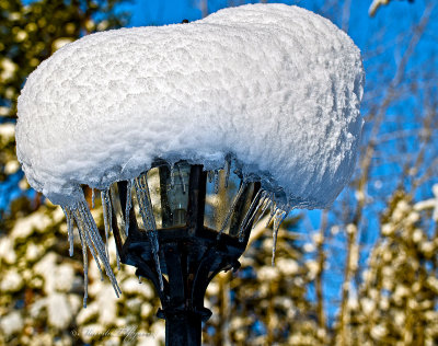 Lamp with a snow hat and icicles, Sweden