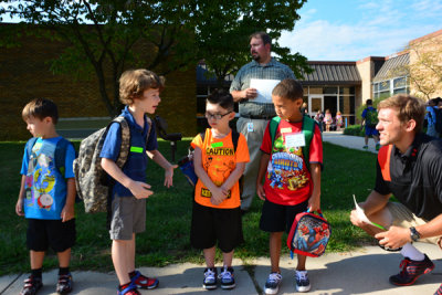 waiting in line with the other kindergarteners