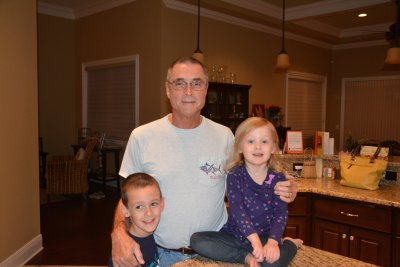 Papa with Caden and Kaitlyn on his birthday