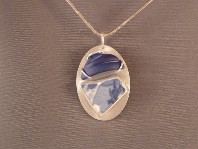 Cobalt beach glass with pottery shard. Both from Crescent Beach.
