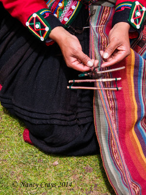 Inca Woman Adding Edging to Woven Cloth