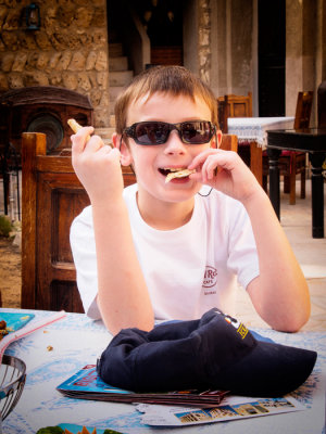 _1026784 Carson eating flat bread in Bastakiah Nights Restaurant