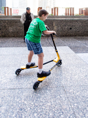 _C255446_Carson on Scooter