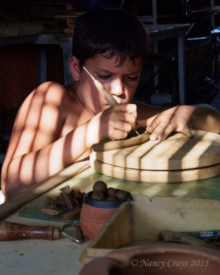 Boy Working on Pottery in Pottery Studio (1226445)
