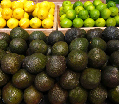 Avocados, Lemons, and Limes on display at Fresh Market.