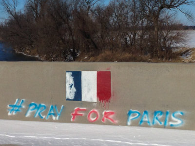 This painting was found on a bridge in northeastern Polk County in Iowa today.

Zoom in on the flag!