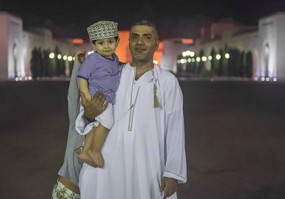 An Omani man and his son