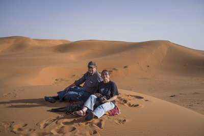 Sahara Desert, sitting on a sand dune