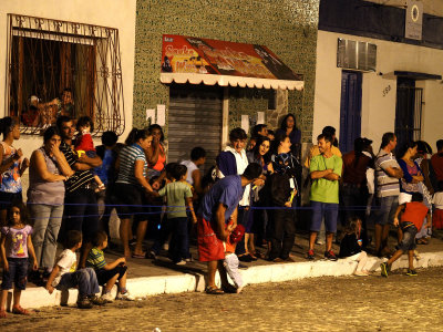 People watching and enjoying carnival.