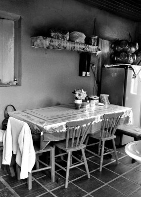 Kitchen of  'Seu Bilé' family, next to the bar. No traffic jams to get to the working place. 