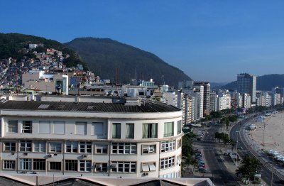 From our hotel top floor: on the left, the Favela Pavão; on the right, Copacabana beach. 