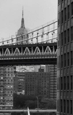 The Manhattan bridge and the Empire State Building, viewed from the Brooklin bridge.