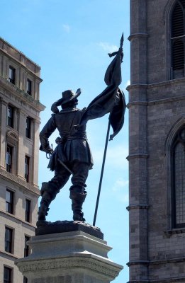 Montreal downtown ; statue at 'Place d'Armes', in front of Notre Dame Church.