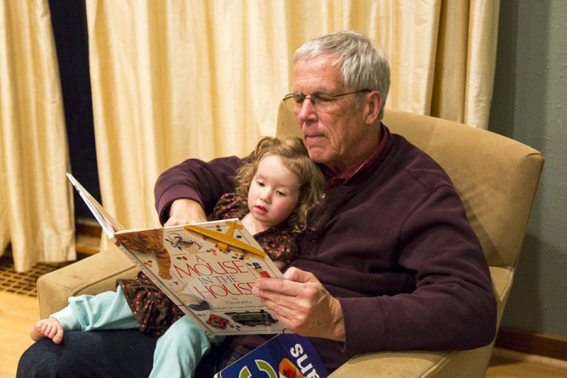 Reading a new book with grandpa