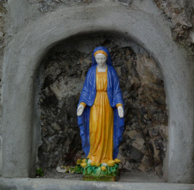 Ceramic Madonna outside ceramics shop at Emerald Grotto