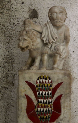Old archaeological find Man and lion exhibit in cloisters