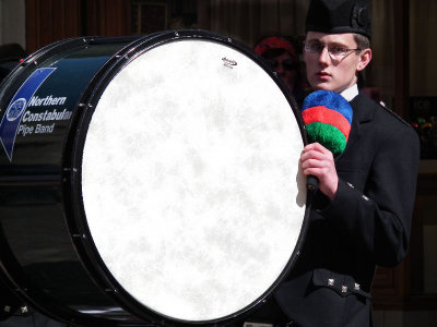 Bass Drummer NCP Band performing in Inverness